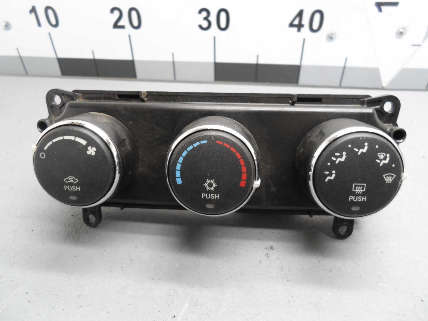 Переключатель отопителя