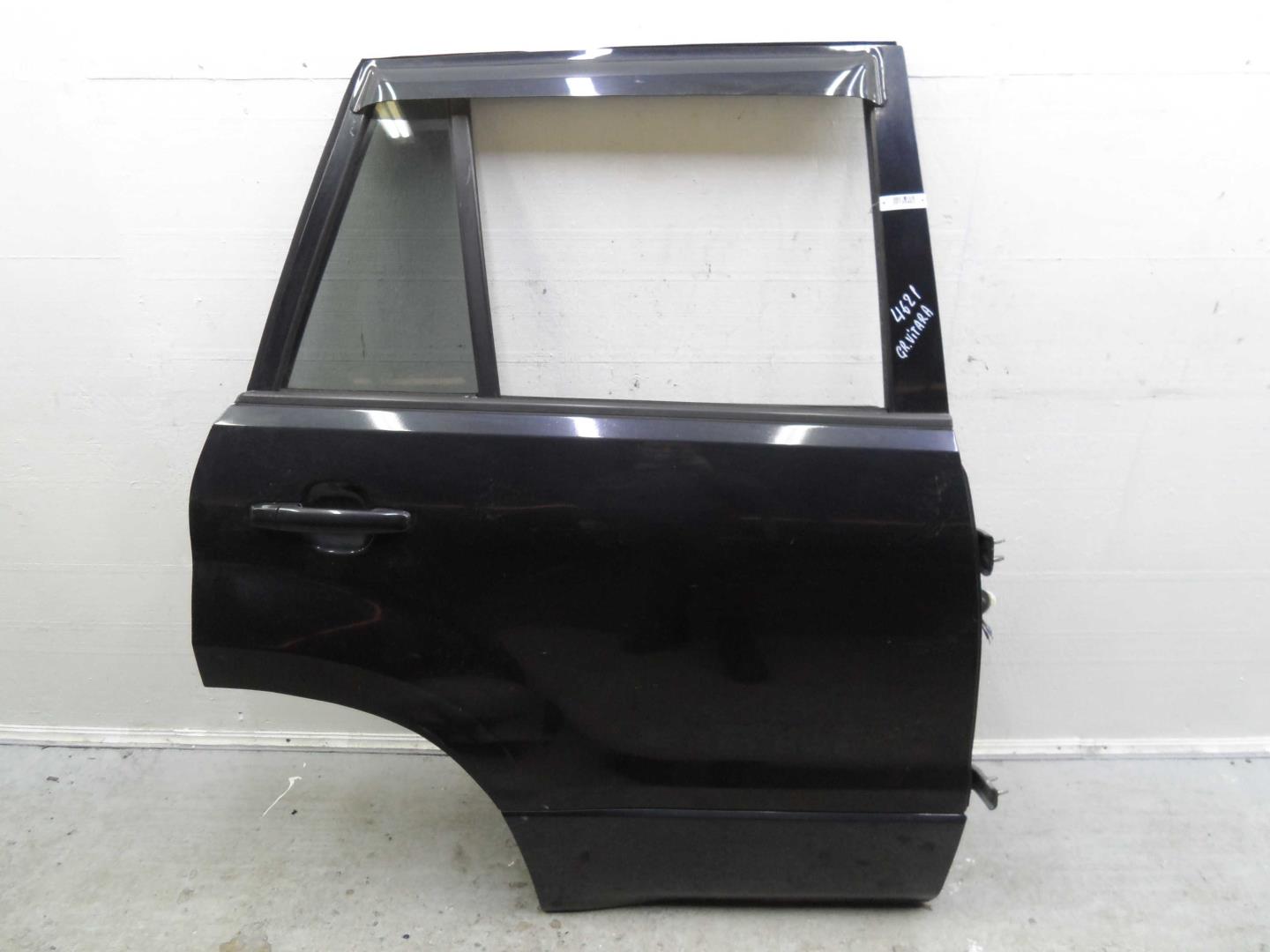 Стекло двери задней правой