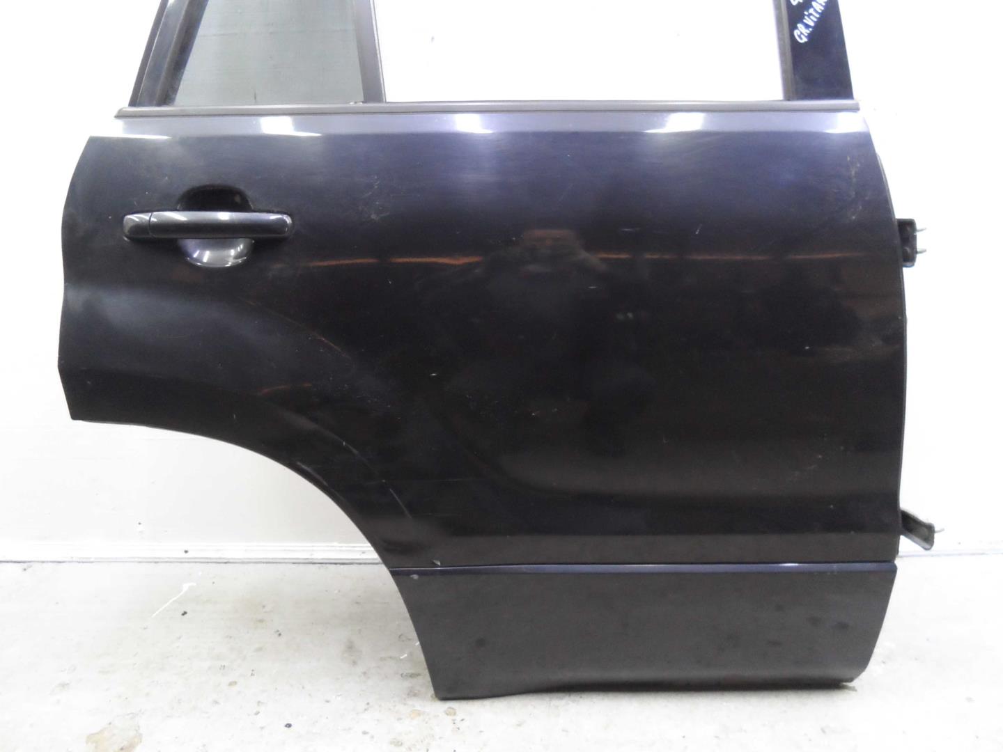 Стекло двери задней правой