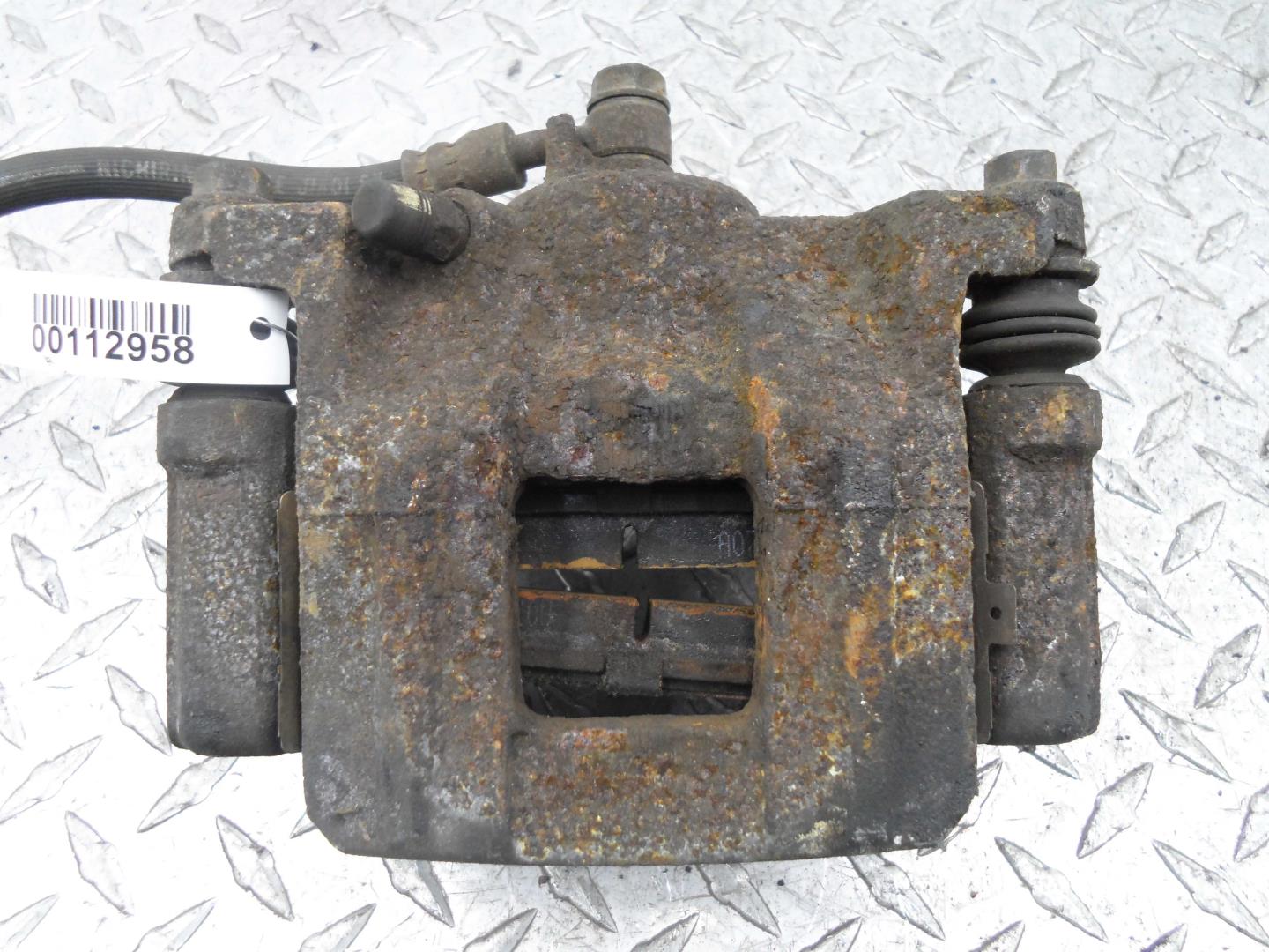 Суппорт задний левый