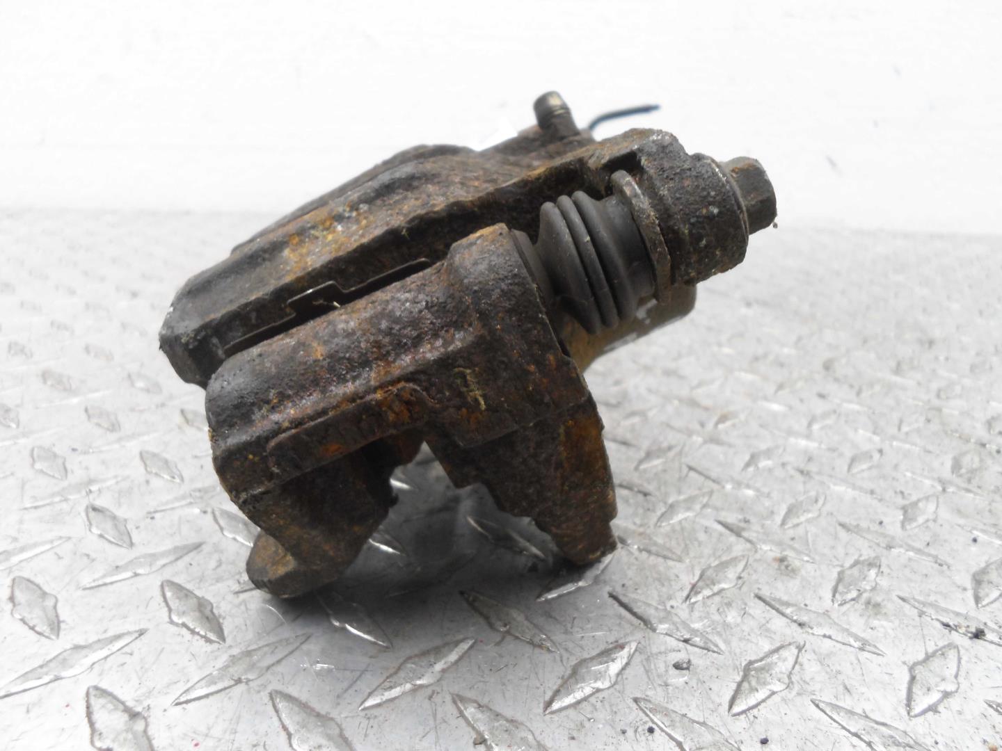 Суппорт задний левый