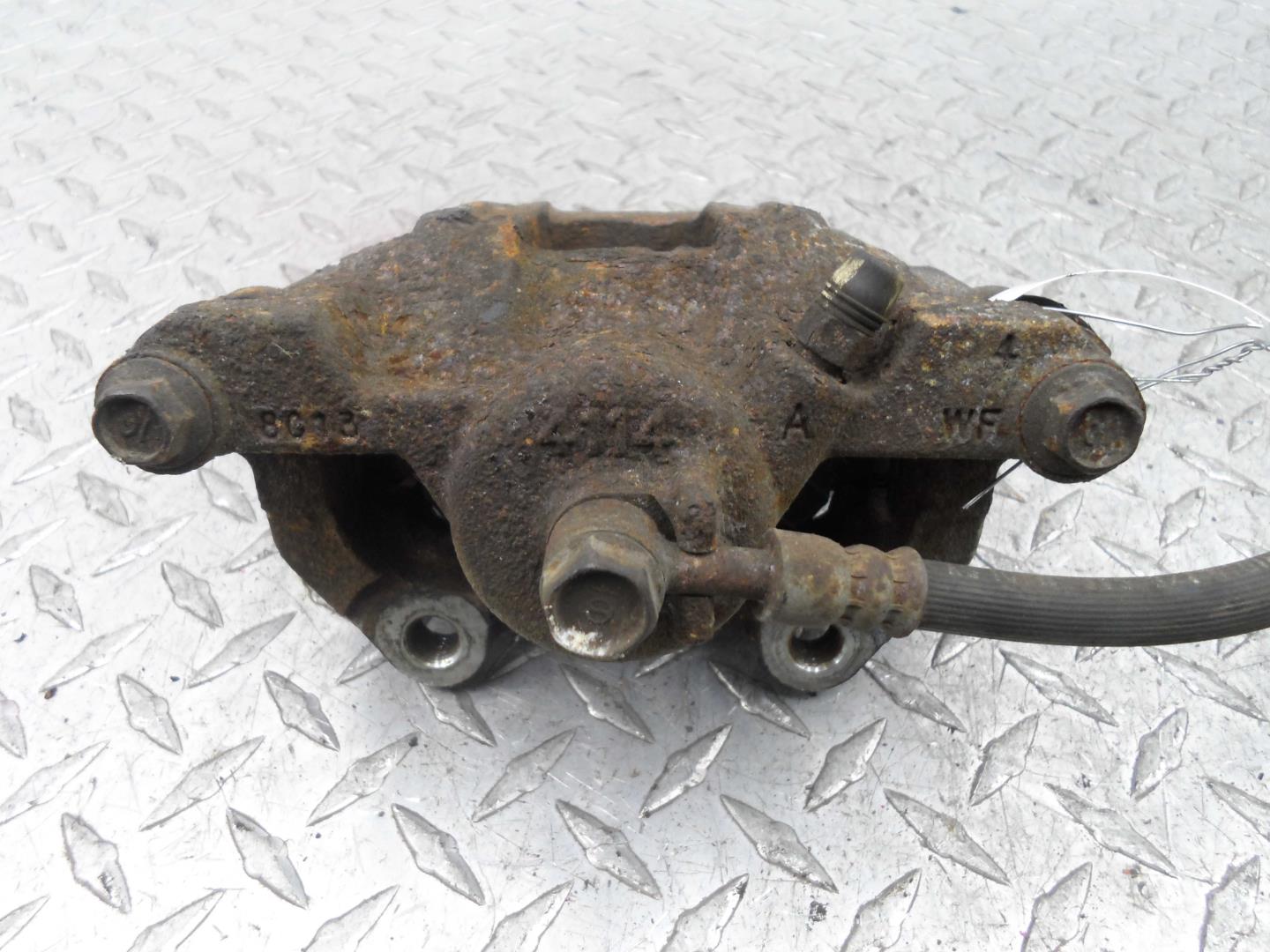 Суппорт задний левый