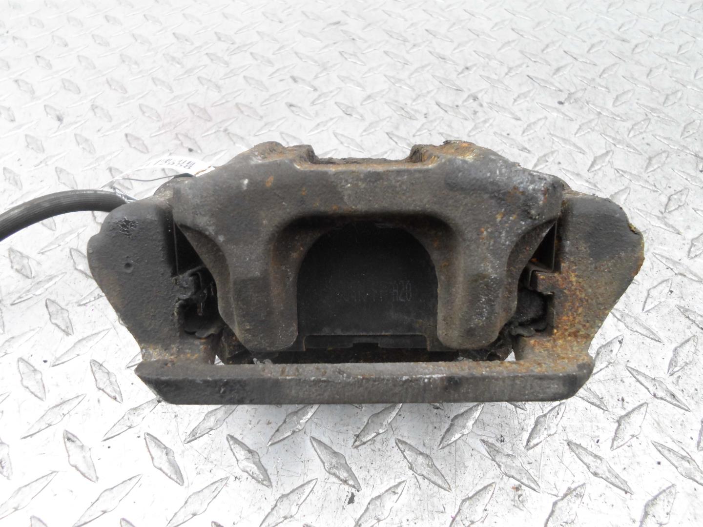 Суппорт задний левый