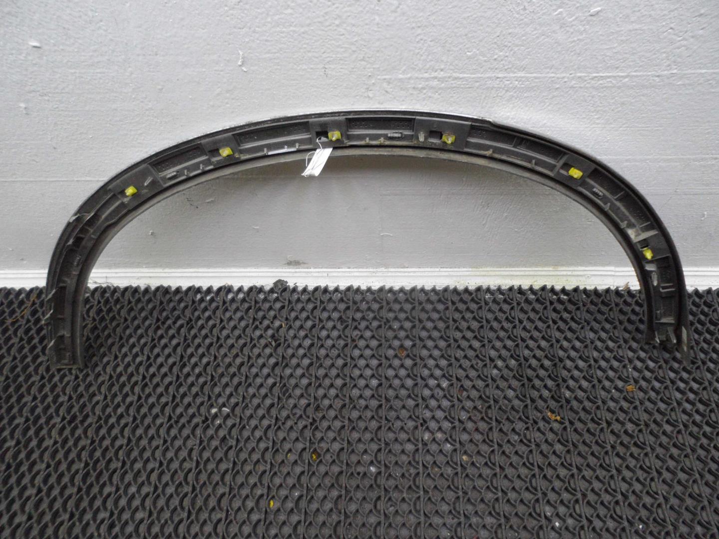 Накладка заднего крыла левого