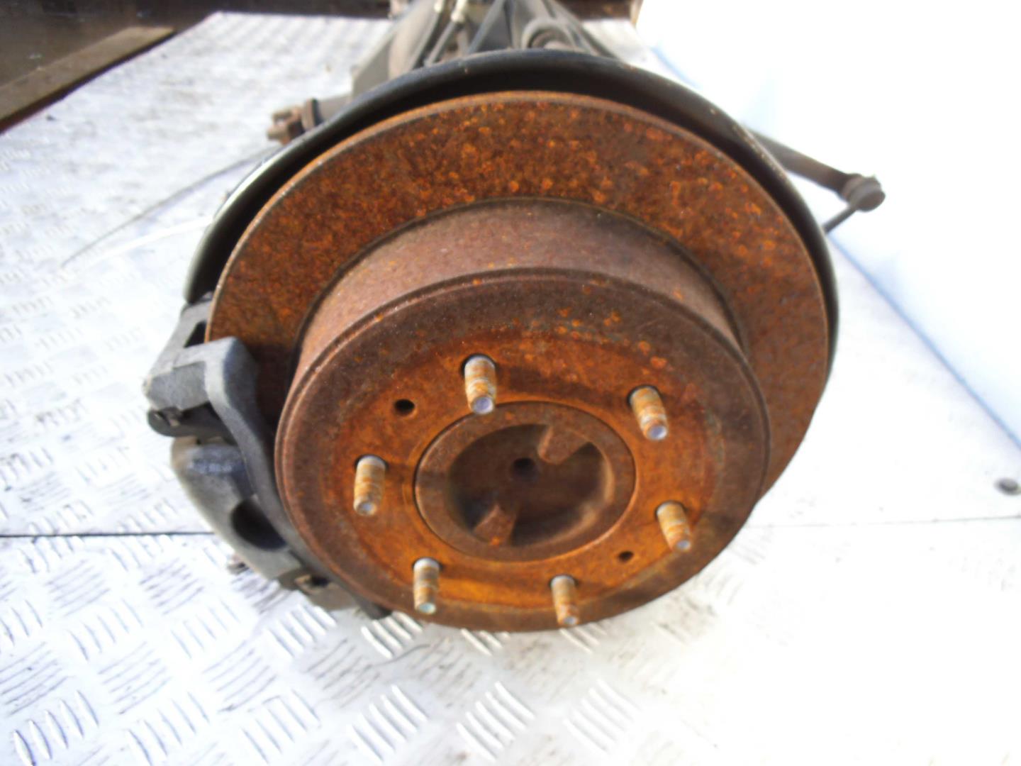 Суппорт задний левый