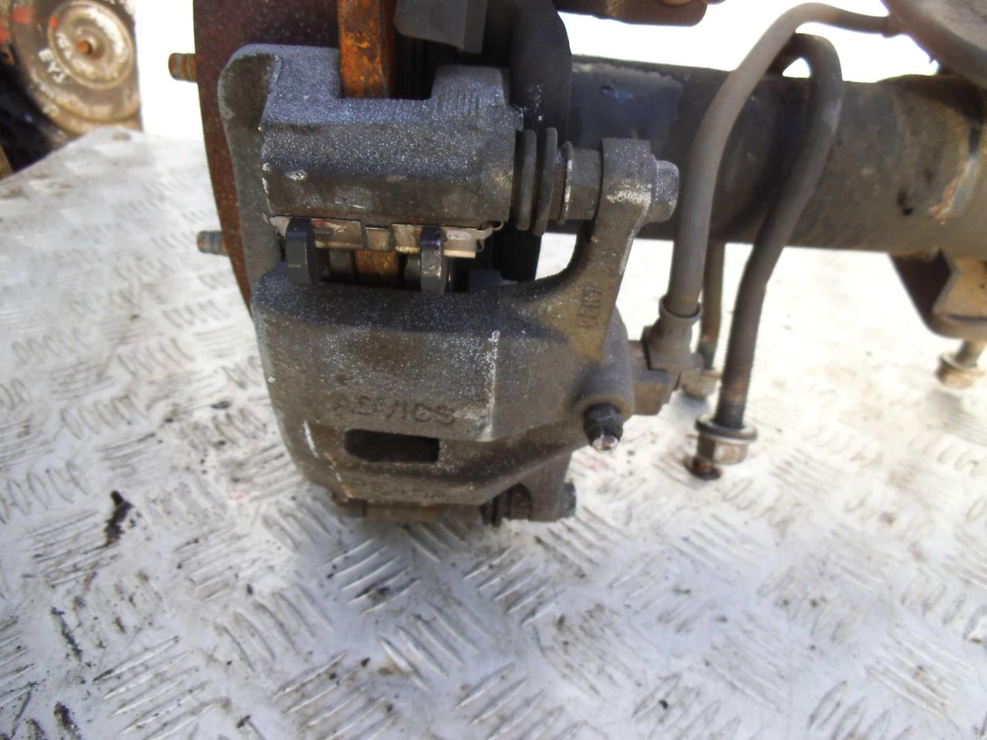 Суппорт задний левый