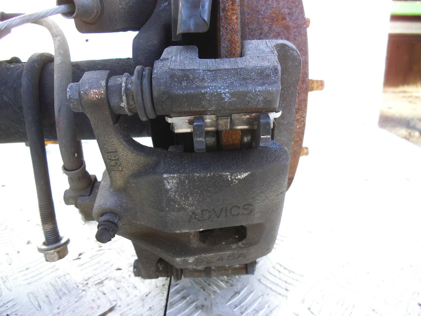 Суппорт задний левый