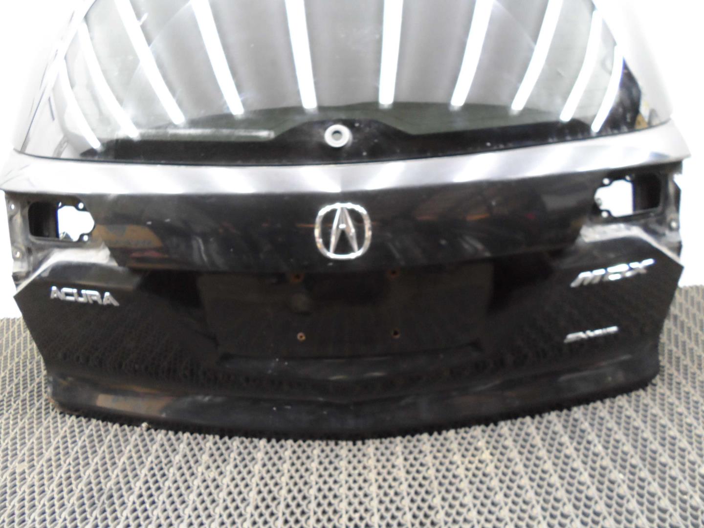 Замок багажника