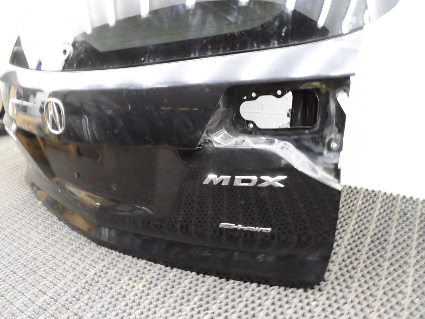 Замок багажника