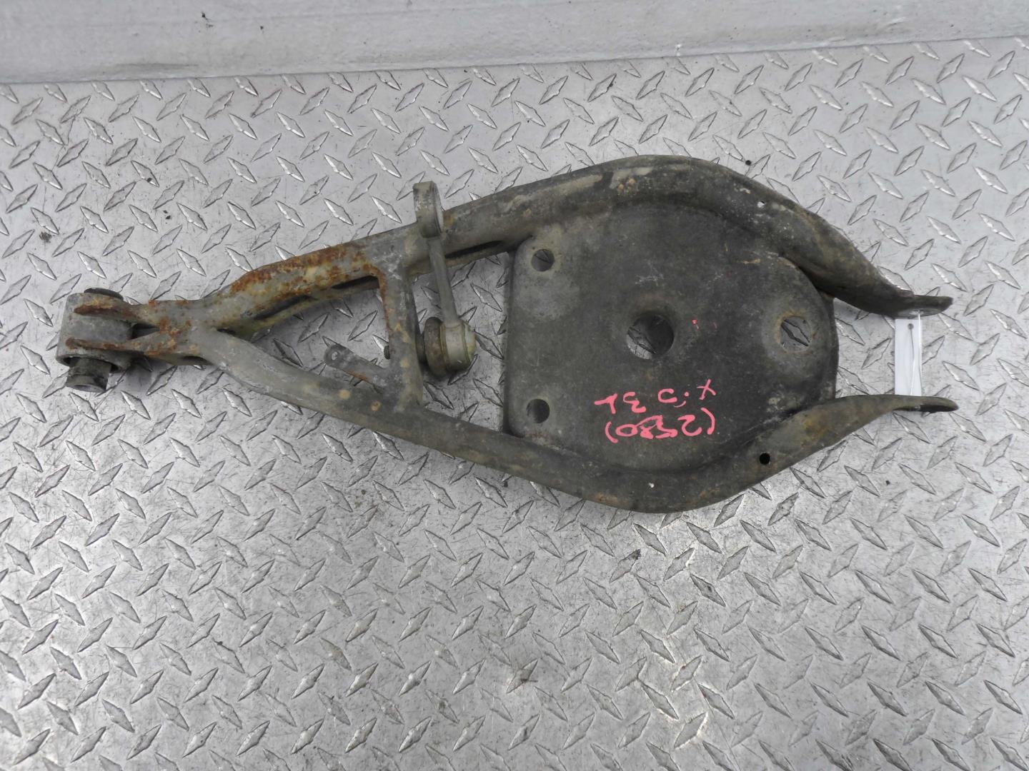 Рычаг задний левый