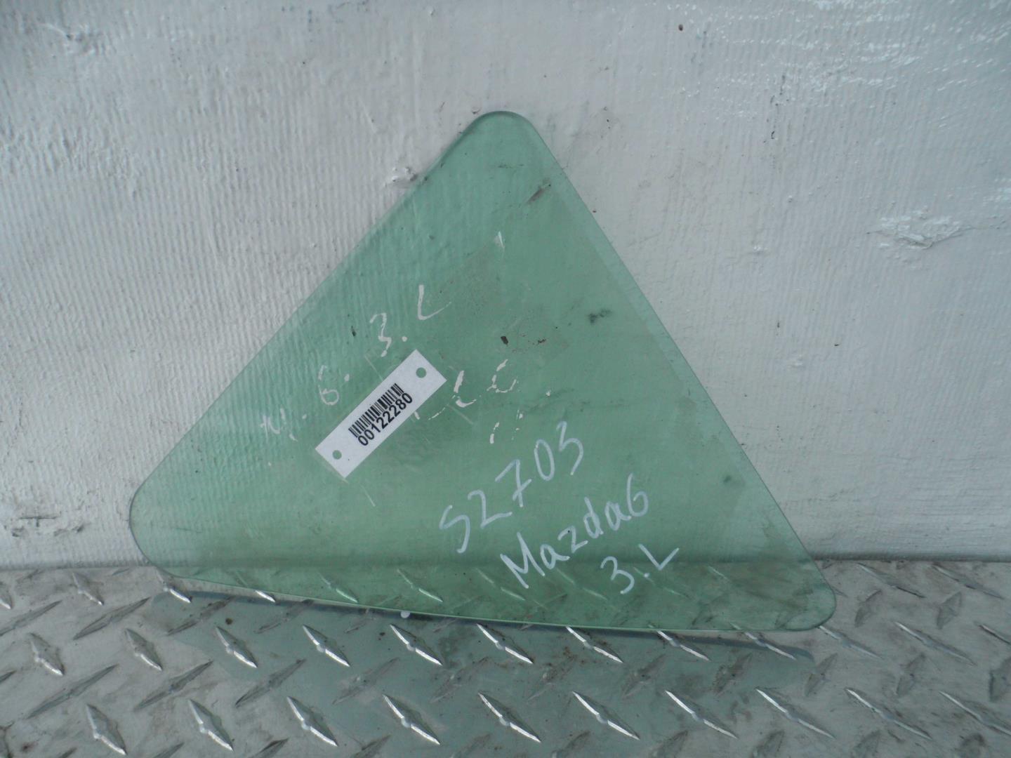 Стекло двери задней левой