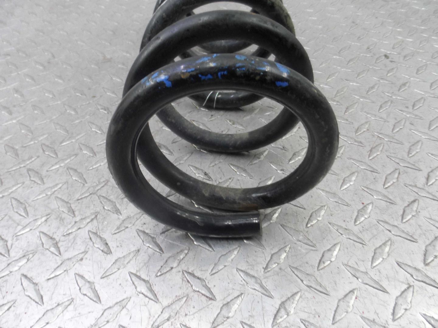 Пружина задняя