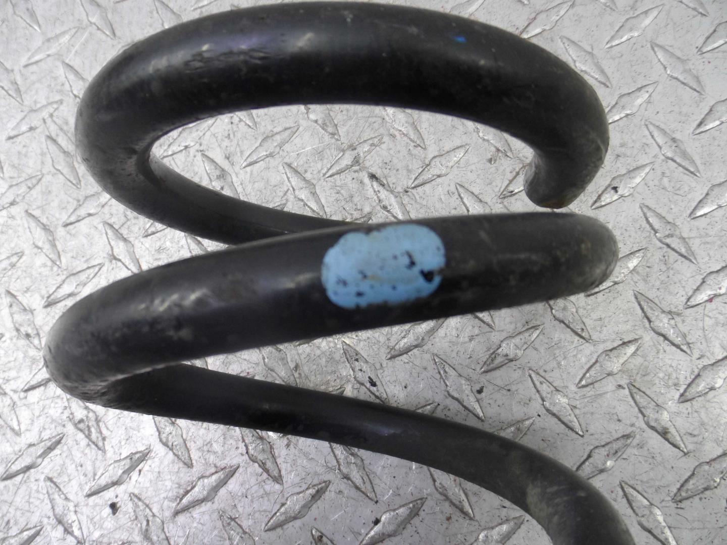 Пружина задняя