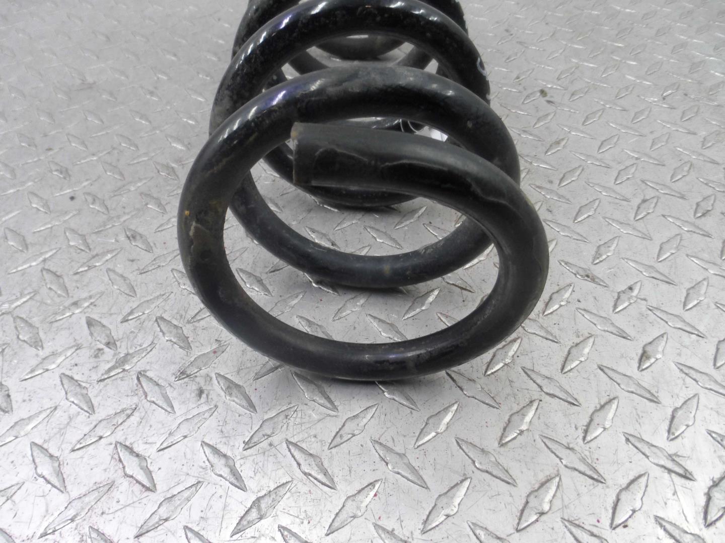 Пружина задняя