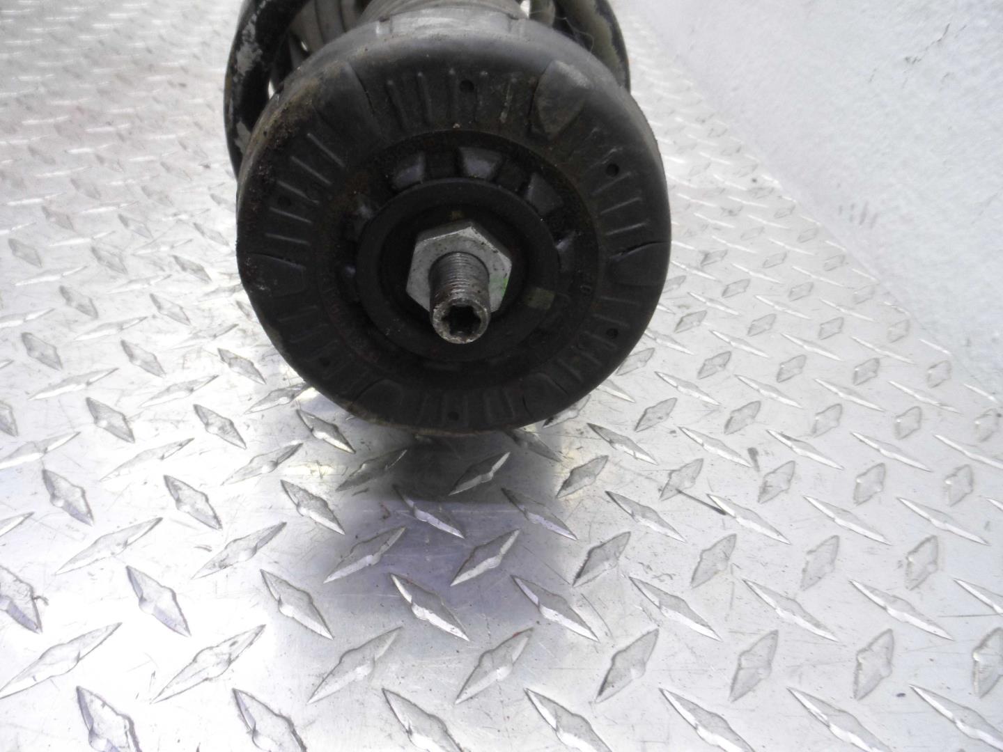 Амортизатор передний левый