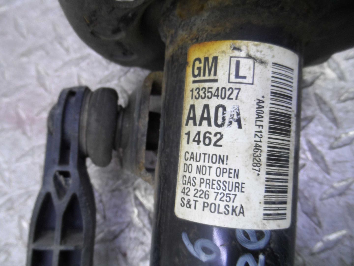 Амортизатор передний левый