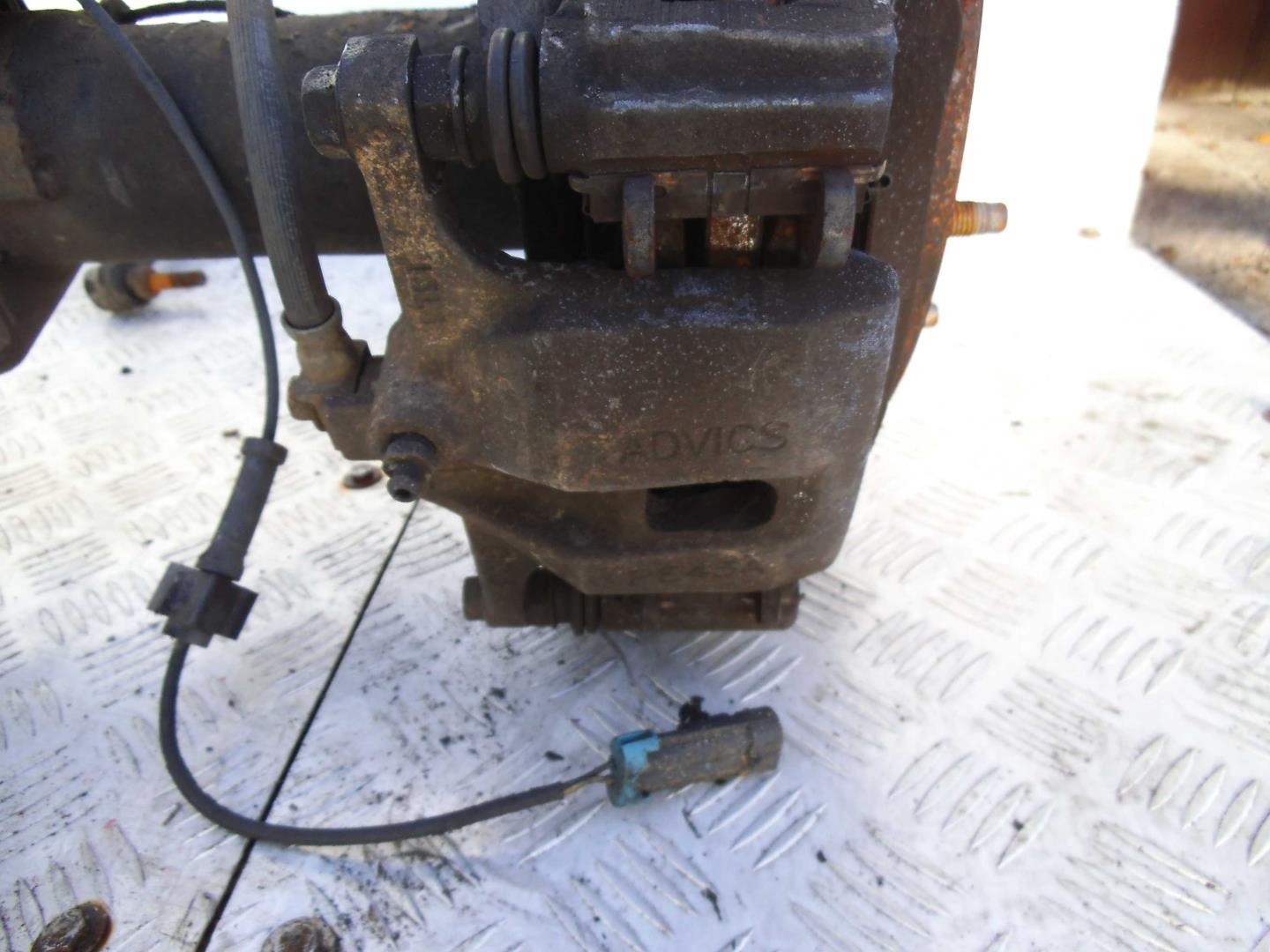 Суппорт задний левый