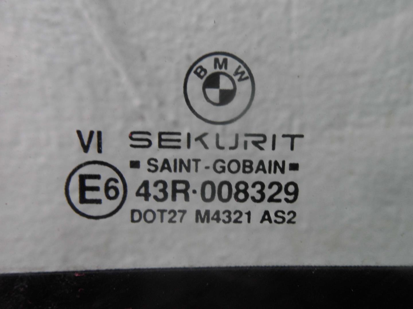 Стекло двери задней левой