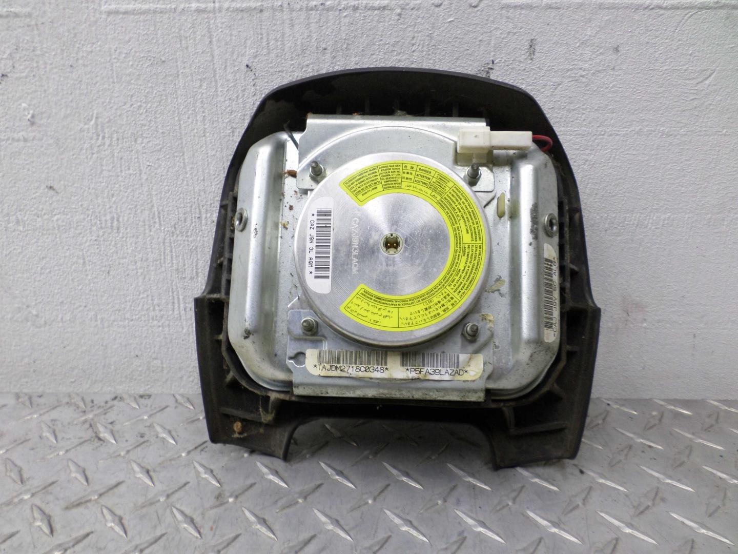 Подушка безопасности в рулевое колесо