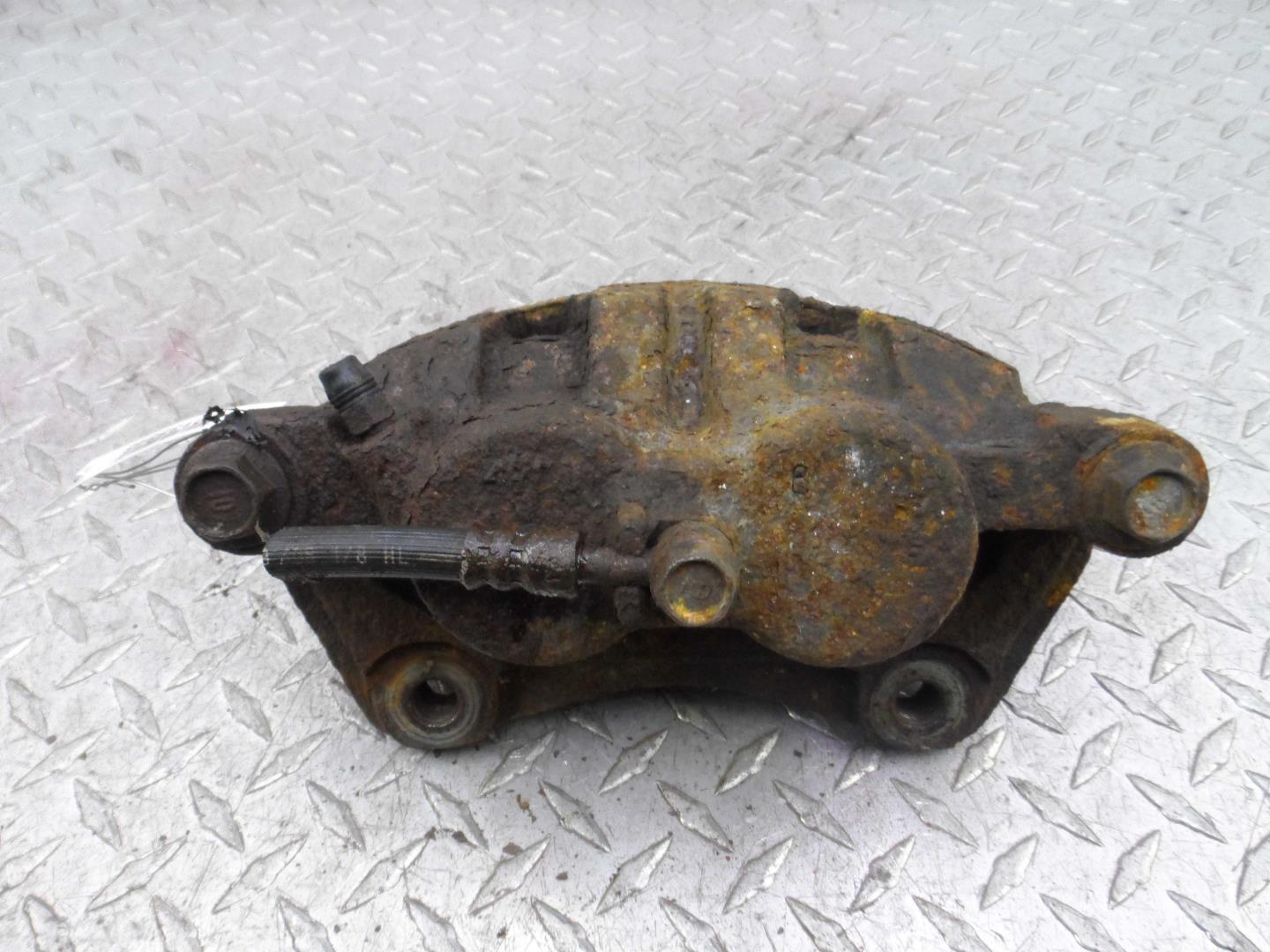 Суппорт передний левый