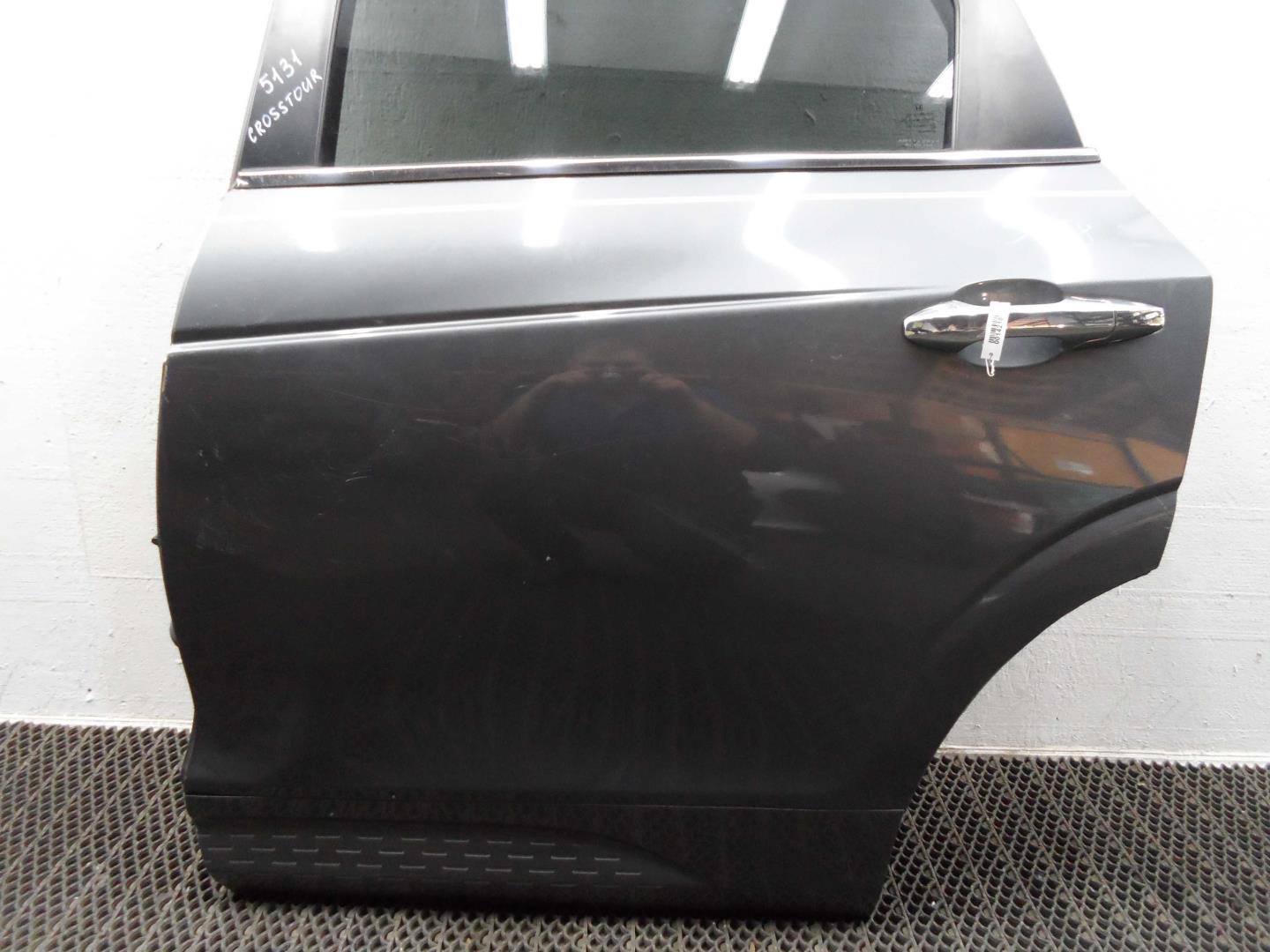 Стекло двери задней левой