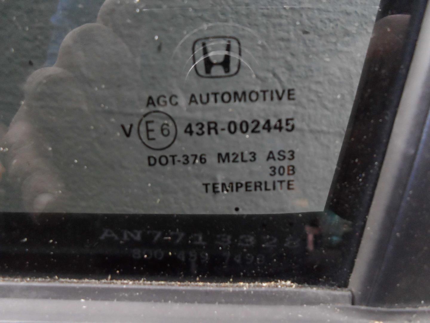 Стекло двери задней левой