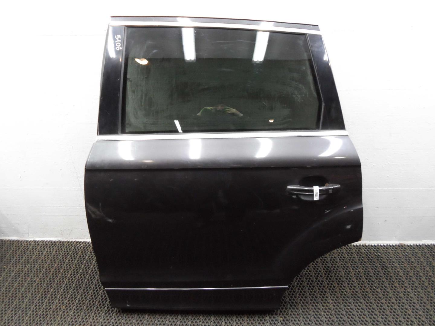 Замок двери задней левой