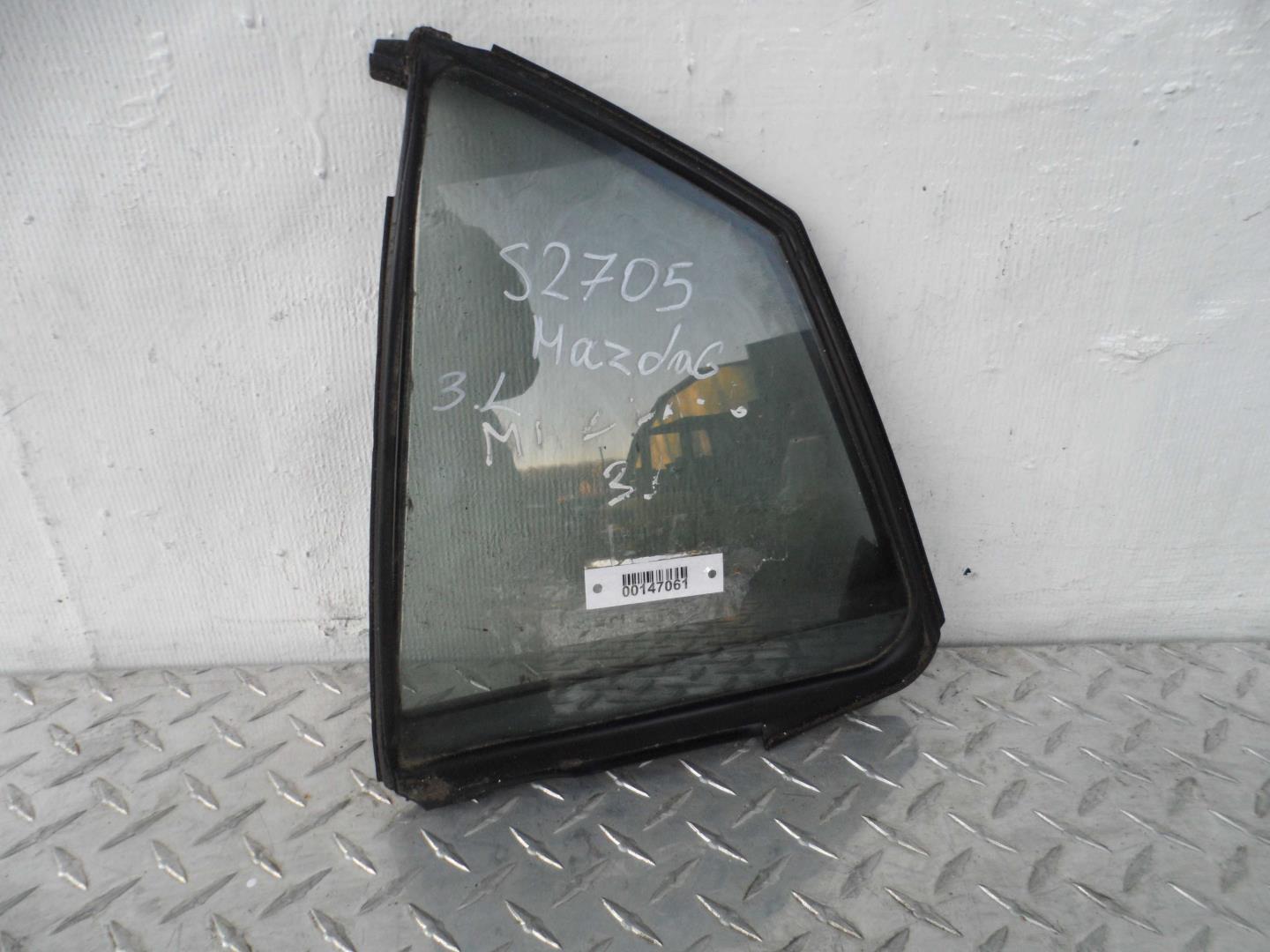 Стекло двери задней левой