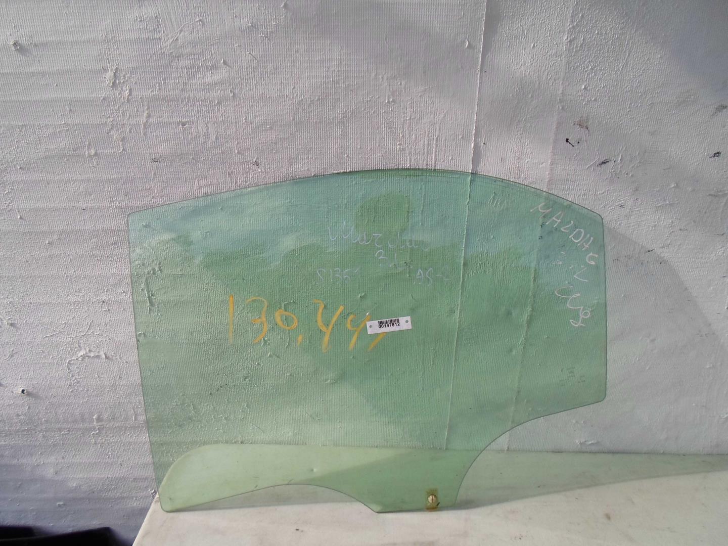 Стекло двери задней левой