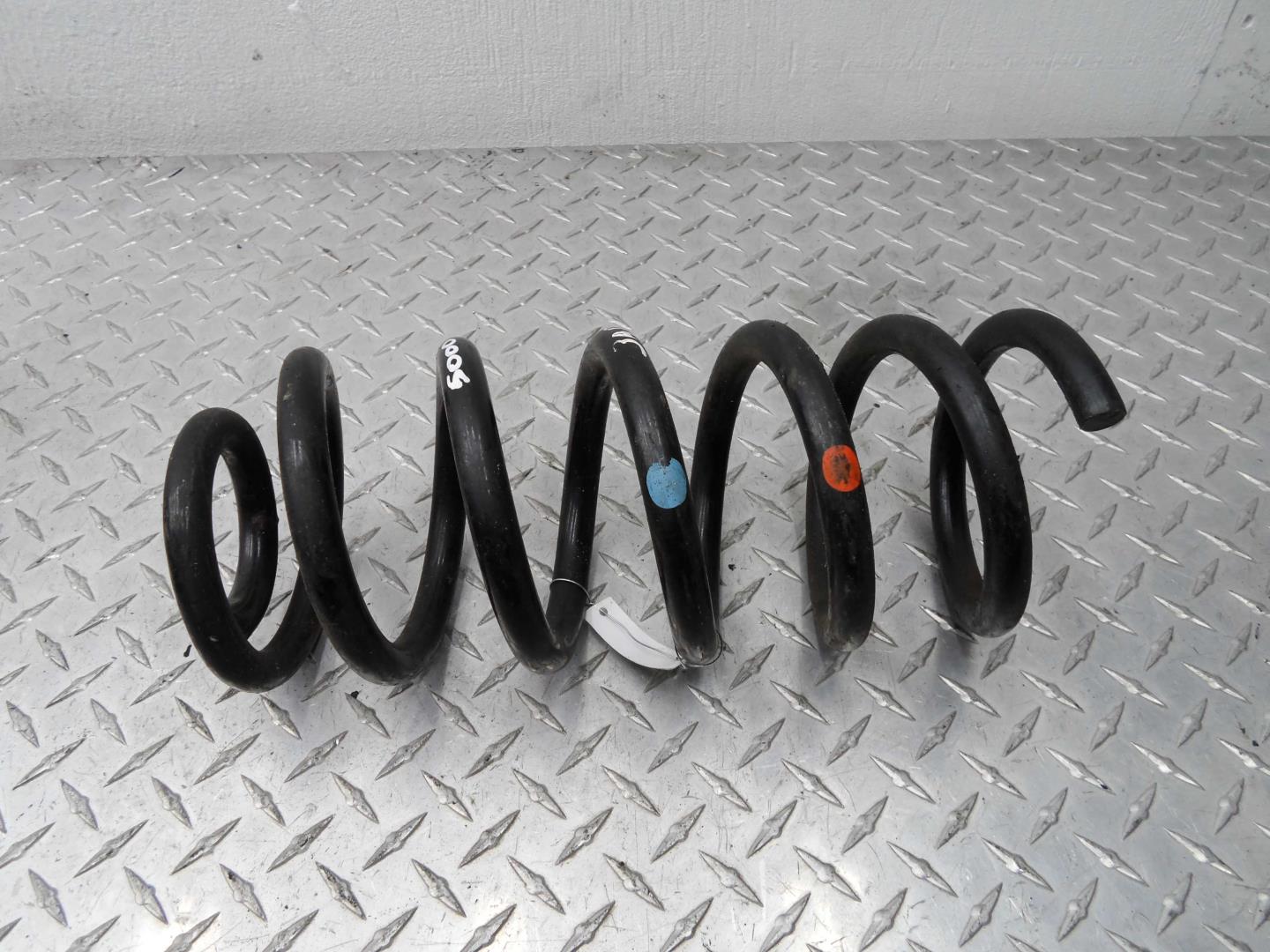 Пружина задняя