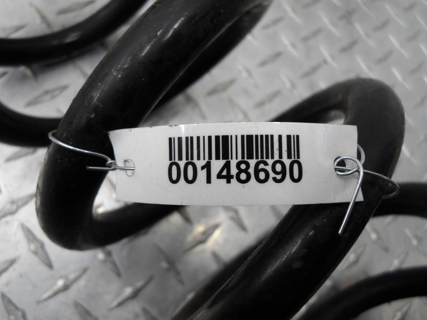 Пружина задняя