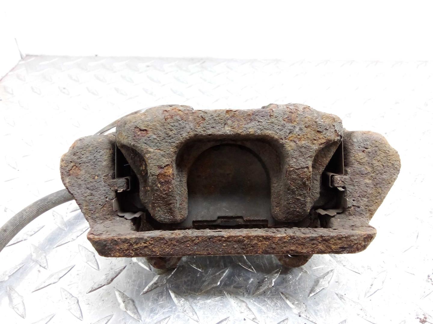 Суппорт задний левый