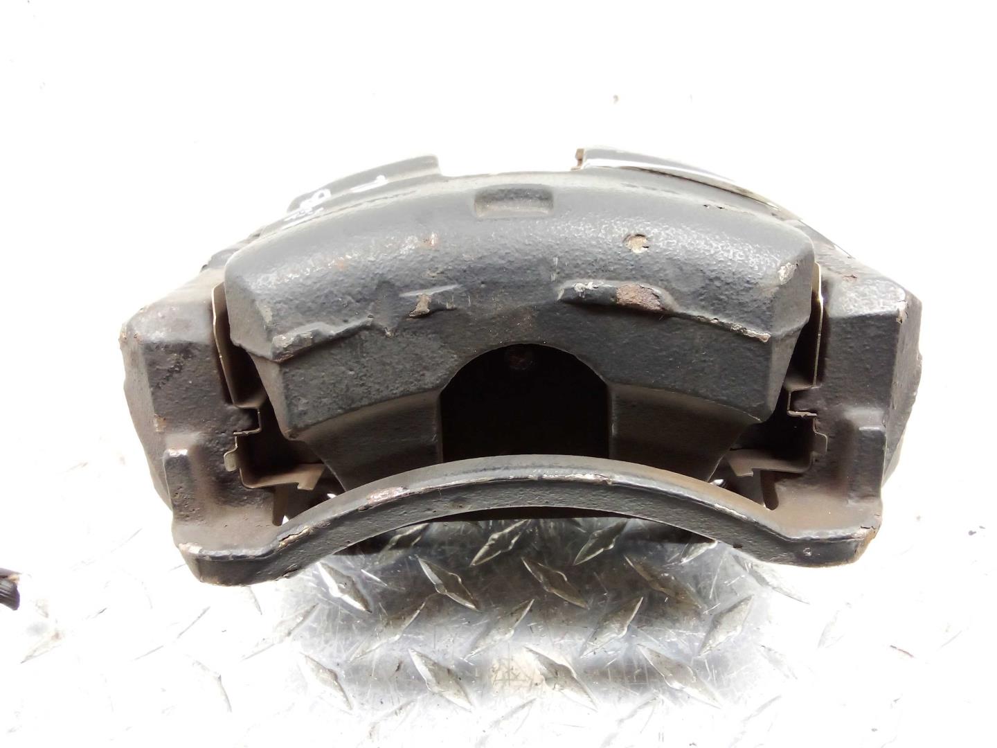 Суппорт передний левый