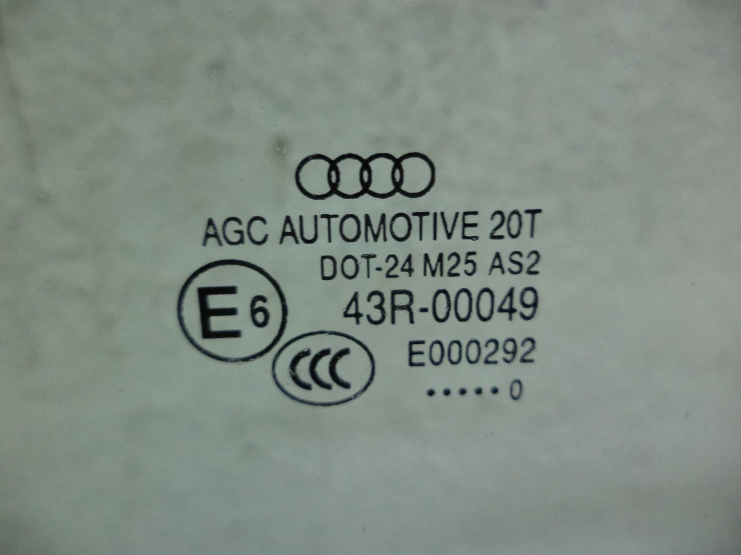 Стекло двери передней левой