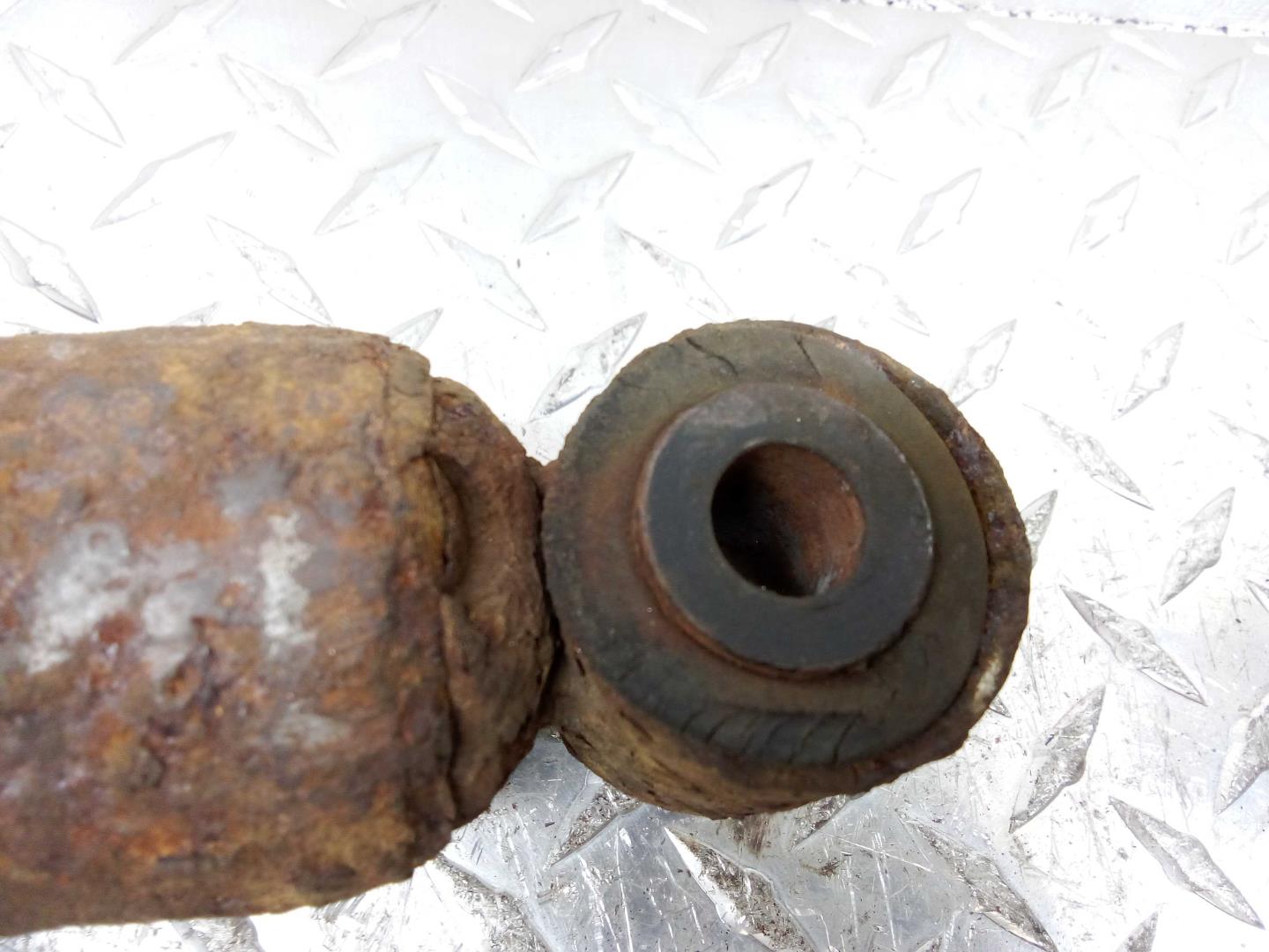 Амортизатор передний левый