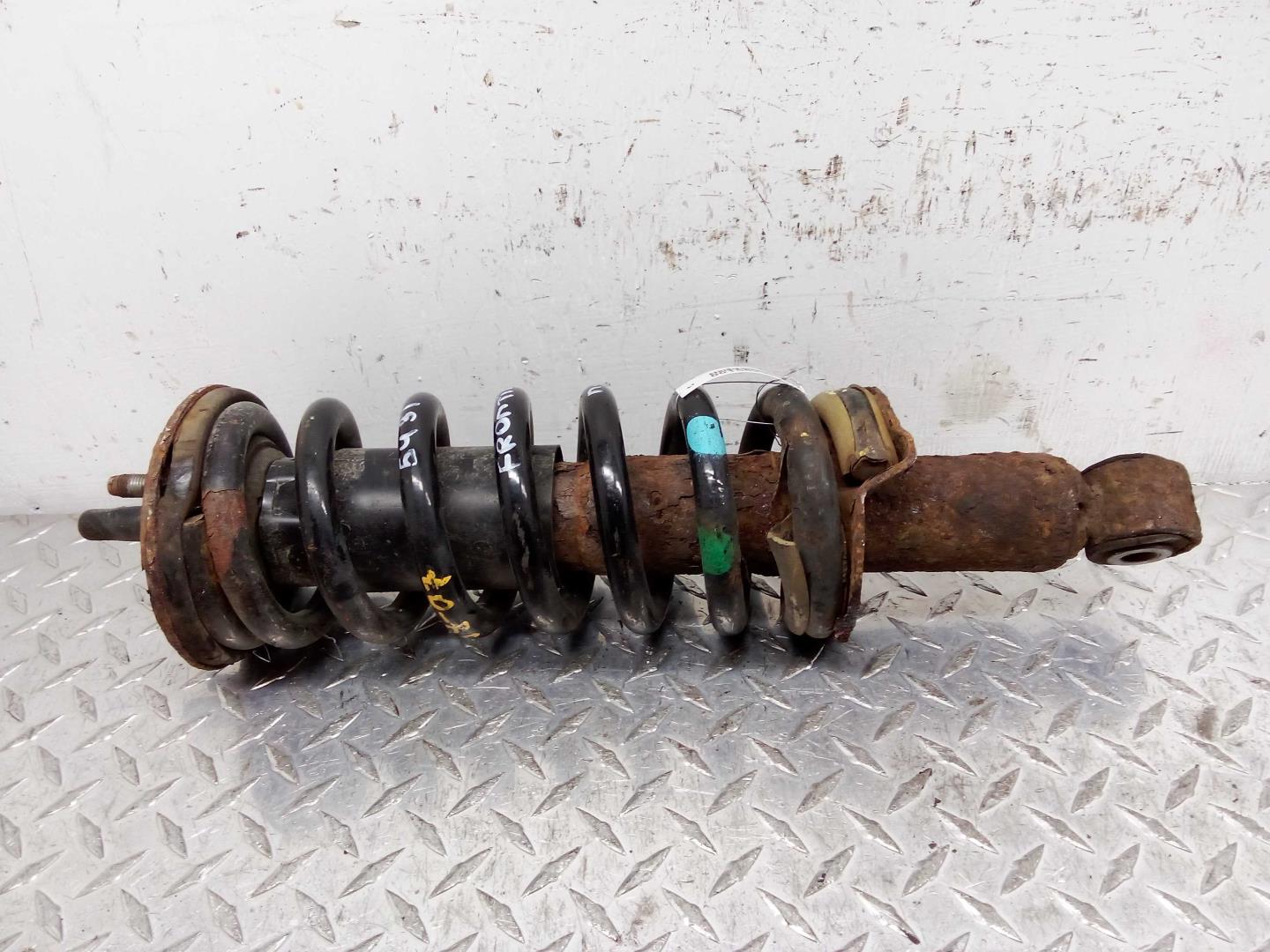 Амортизатор передний левый