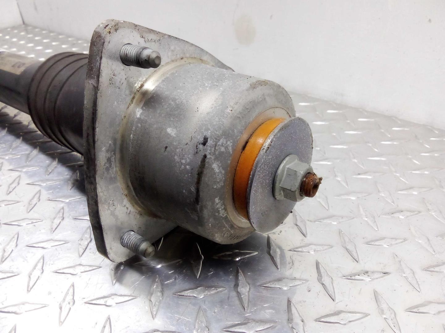 Амортизатор задний левый