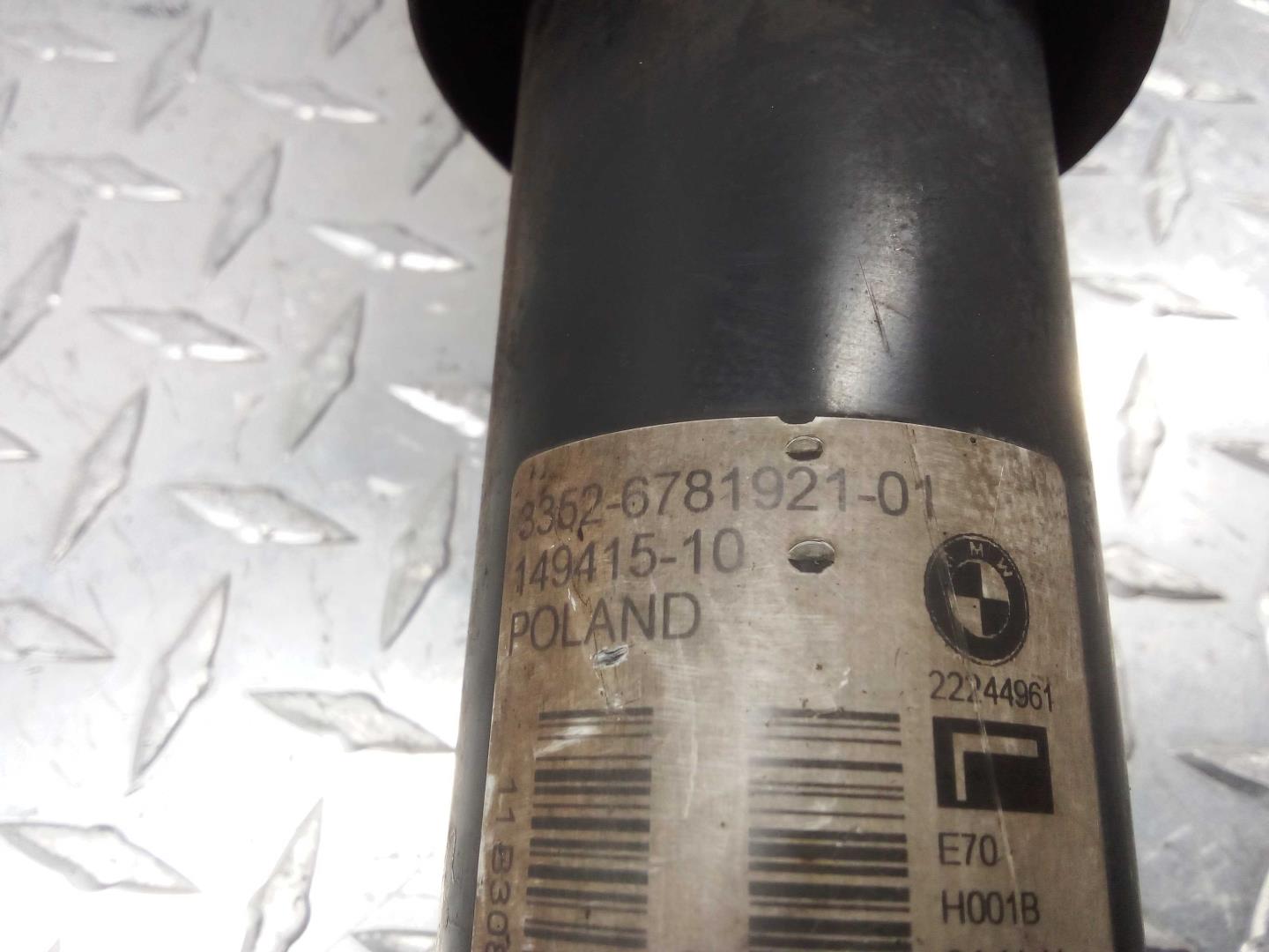 Амортизатор задний левый