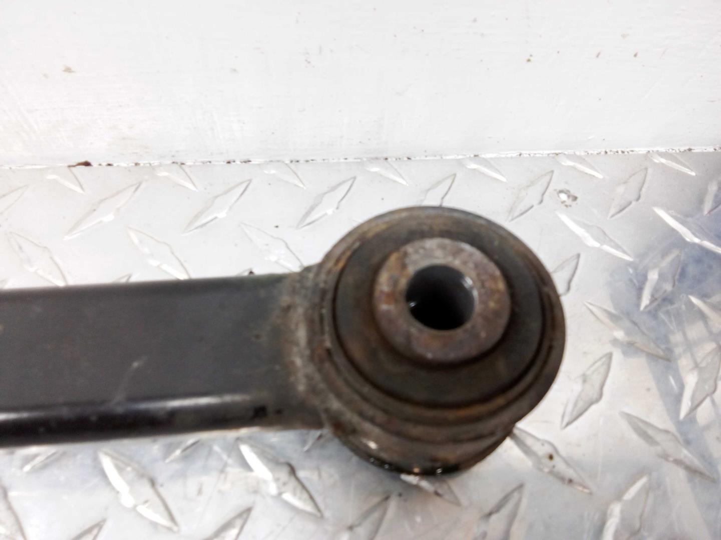 Рычаг задний левый