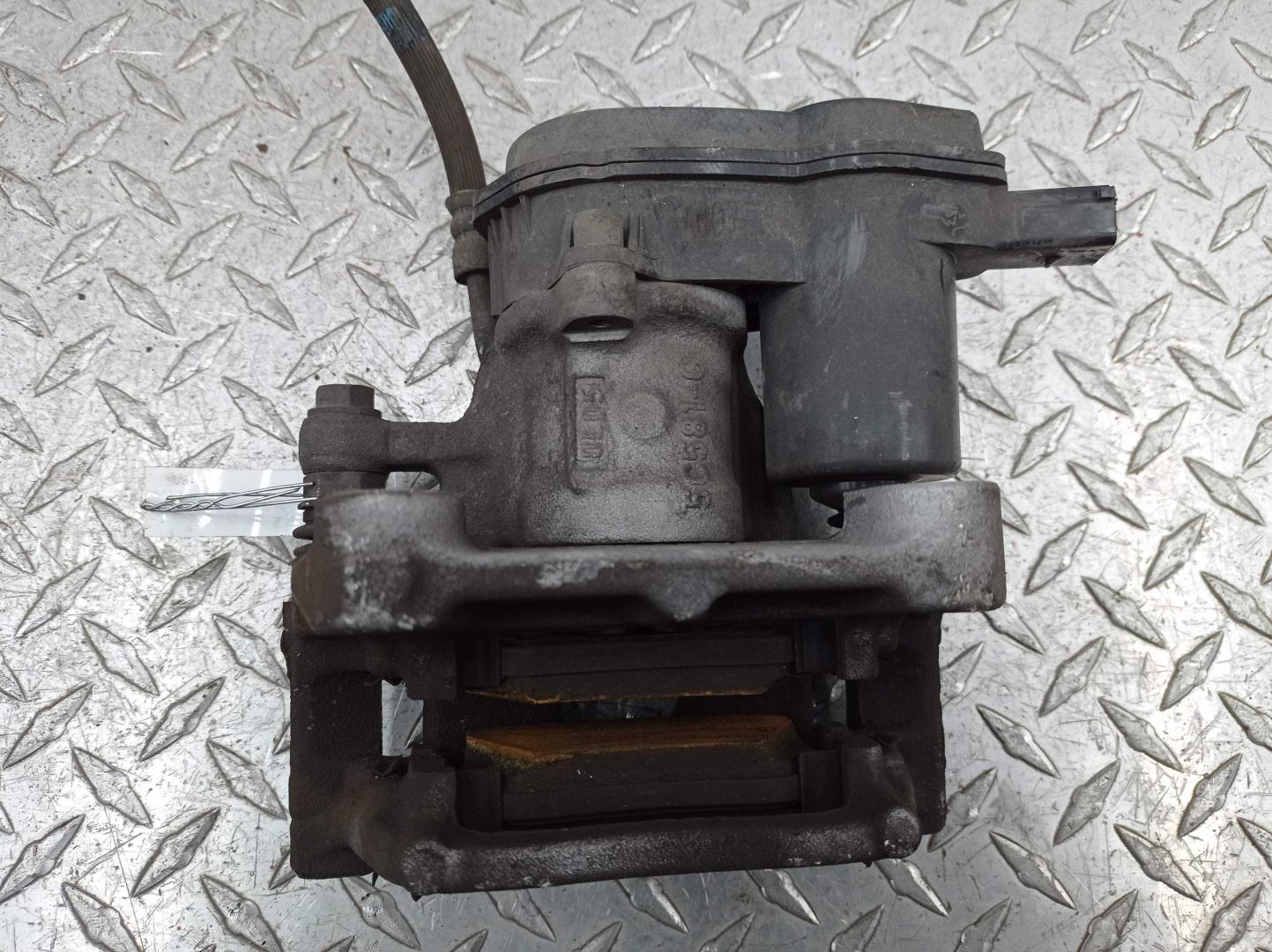 Суппорт задний левый