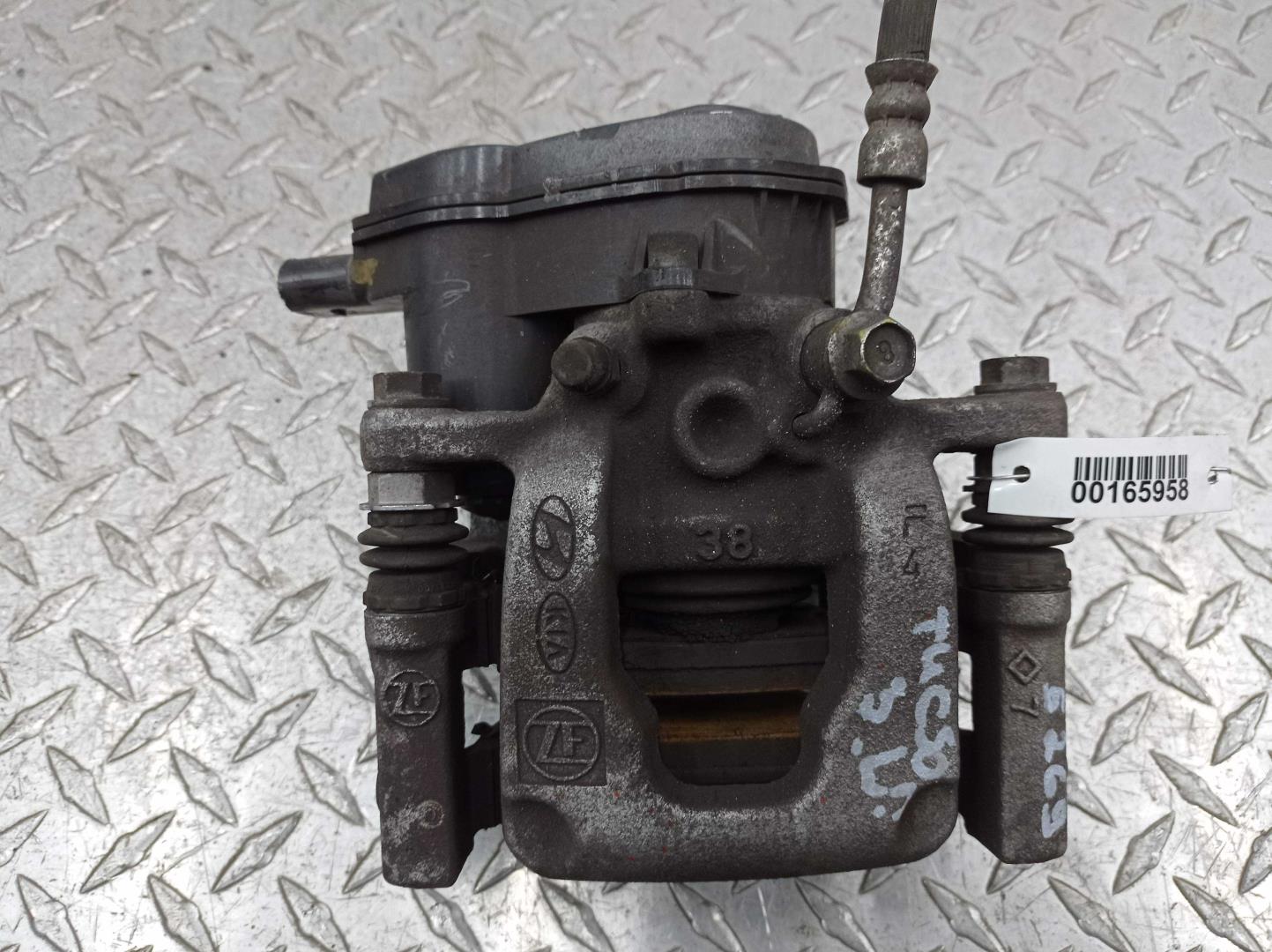 Суппорт задний левый