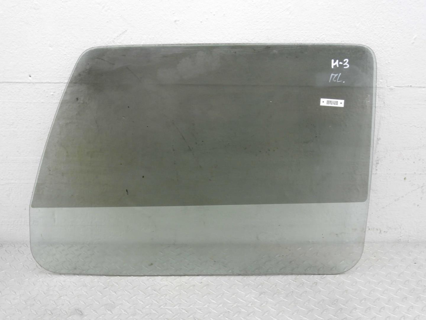 Стекло двери передней левой