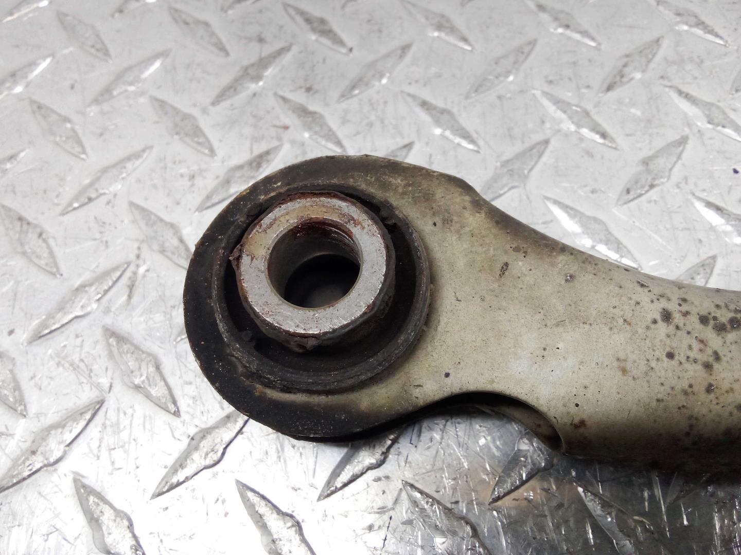 Рычаг задний левый