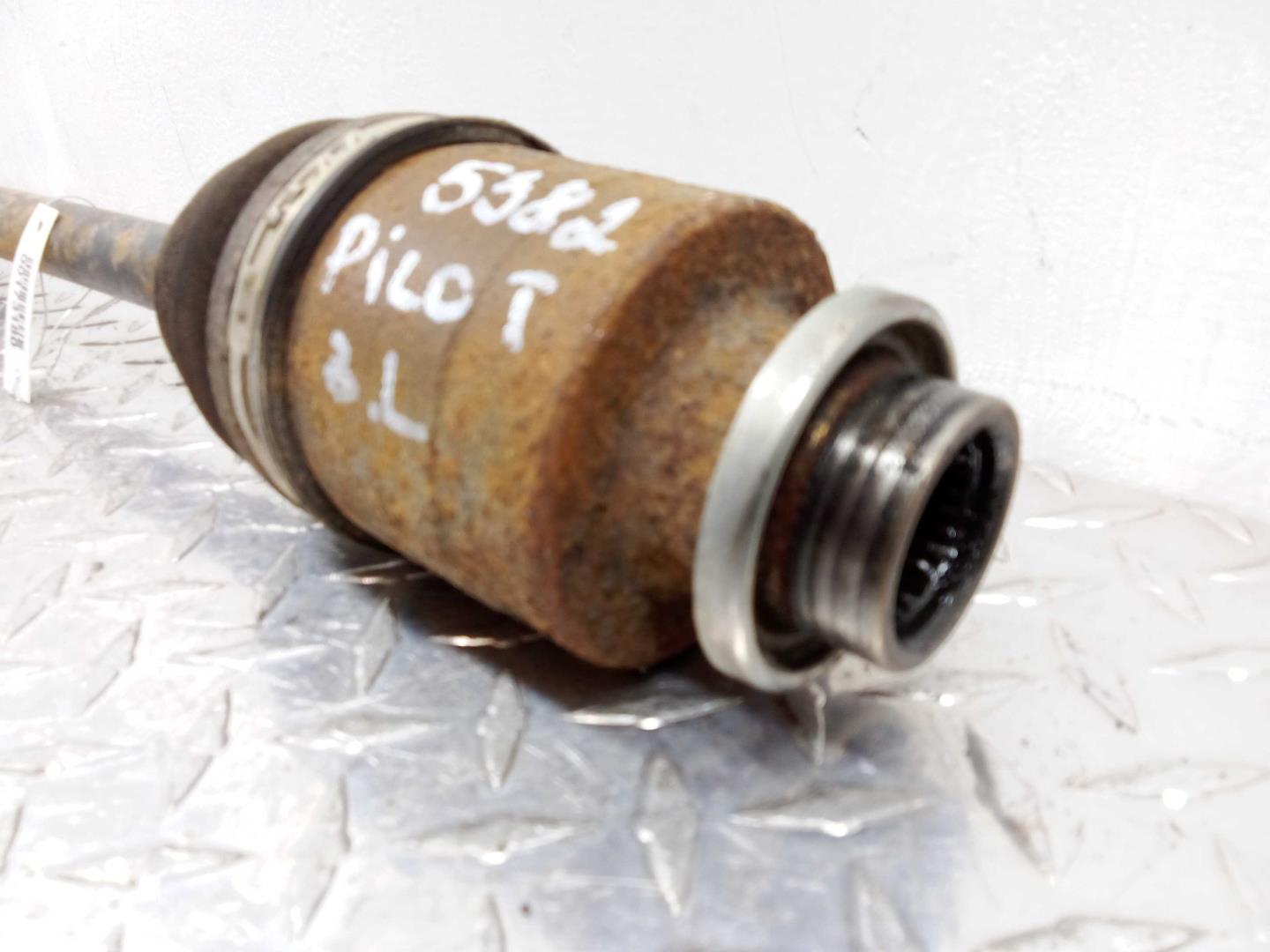 Полуось задняя левая