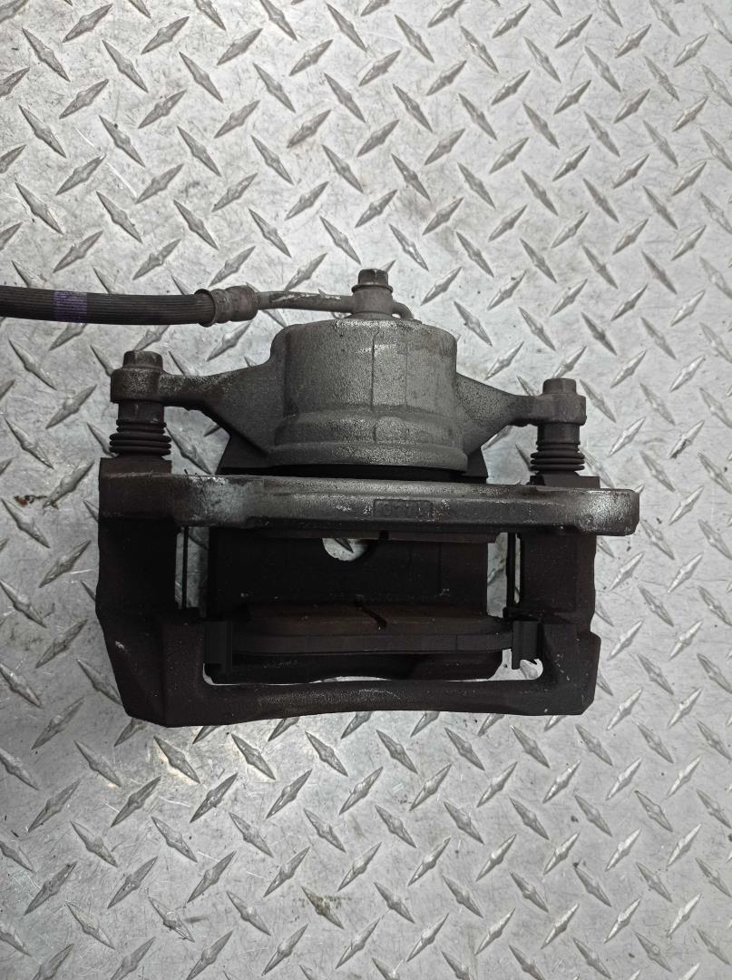 Суппорт передний левый