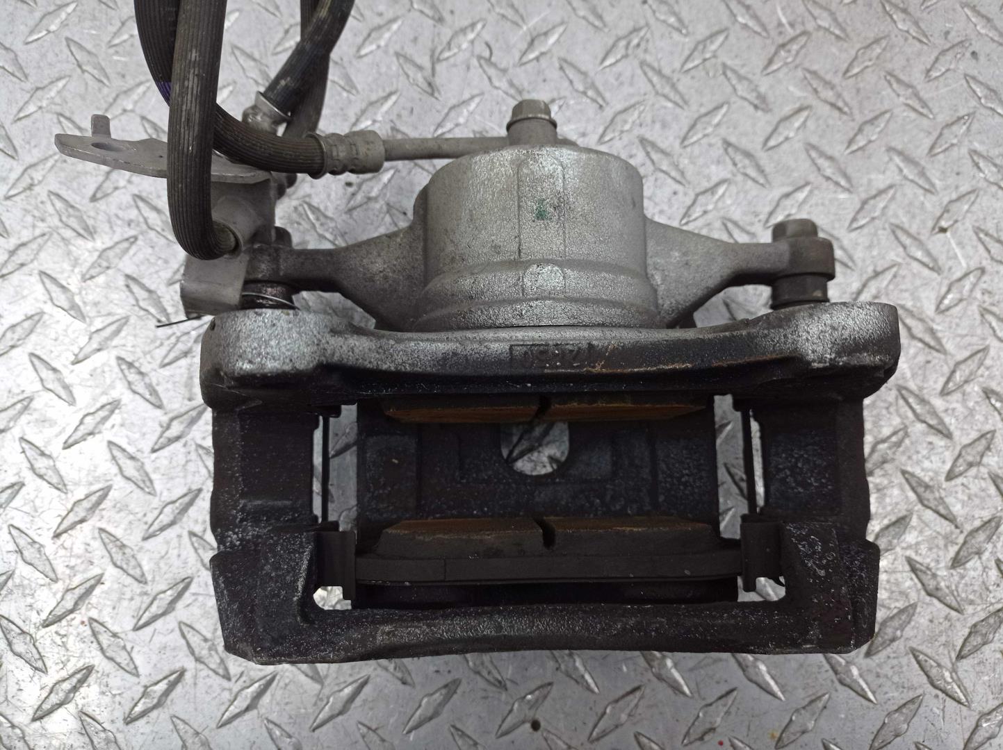 Суппорт передний левый