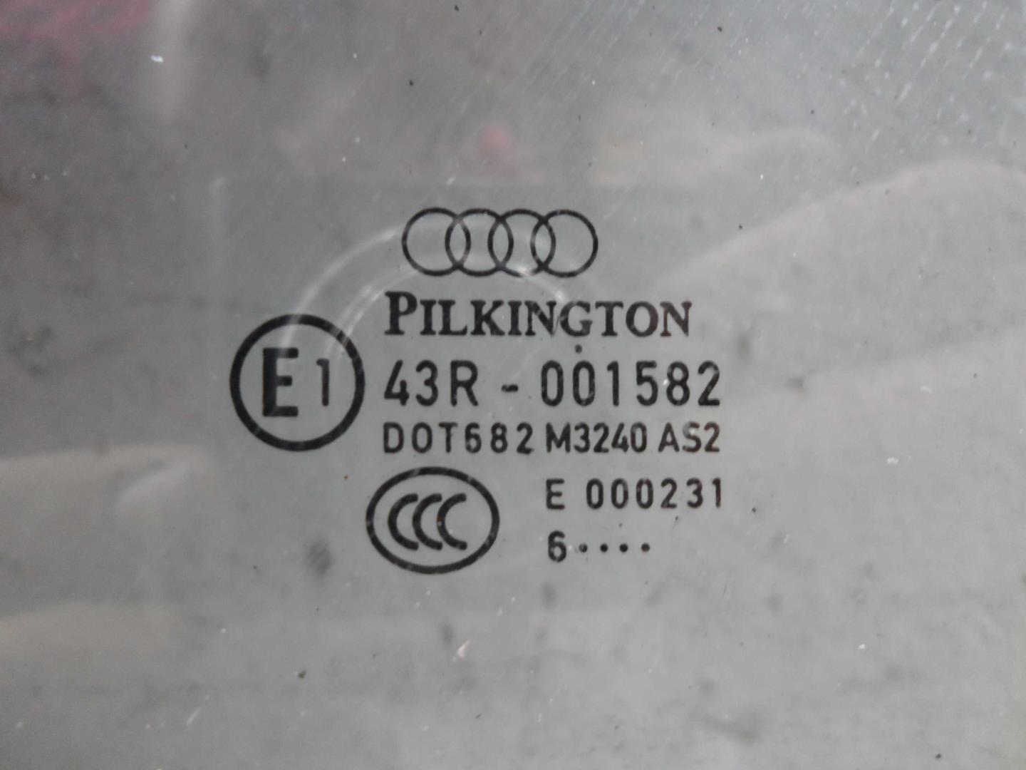 Стекло двери передней левой