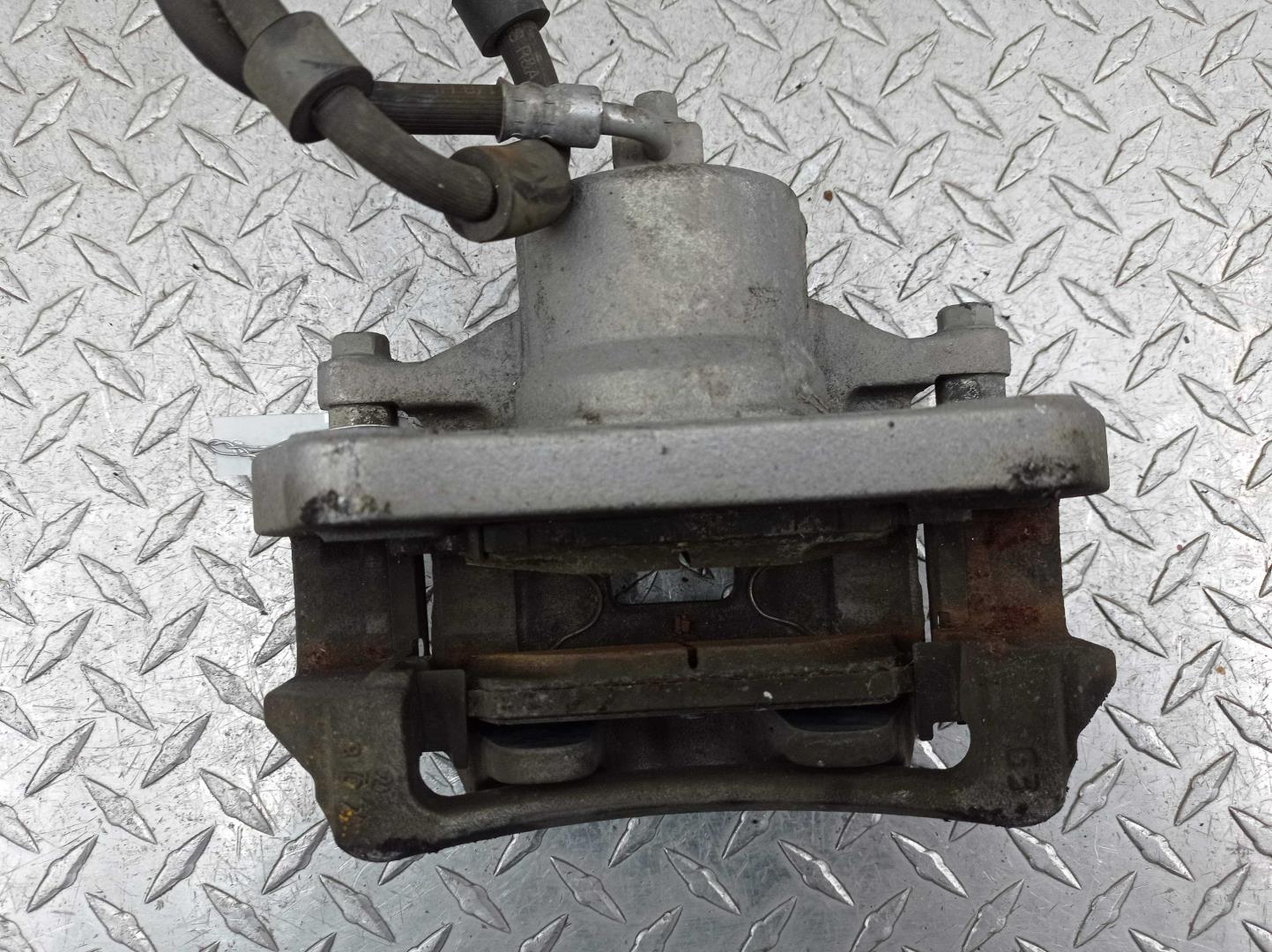 Суппорт передний левый