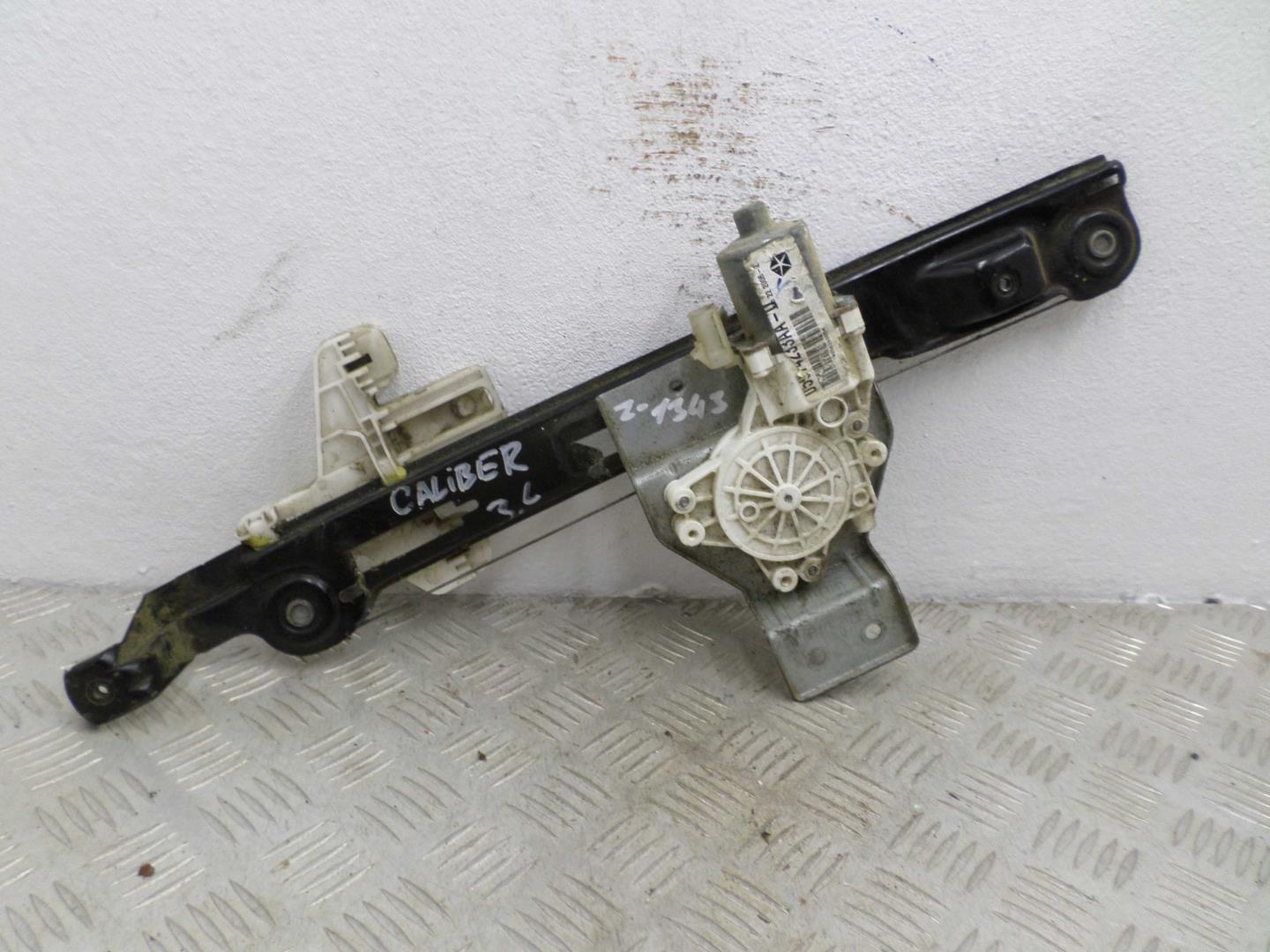 Стеклоподъемник электр. задний левый