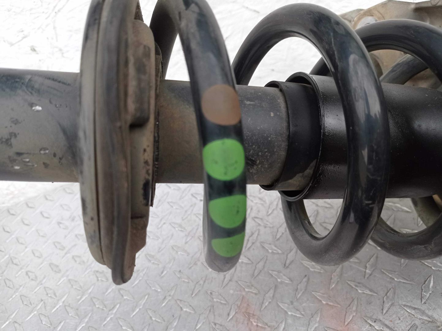 Амортизатор передний левый